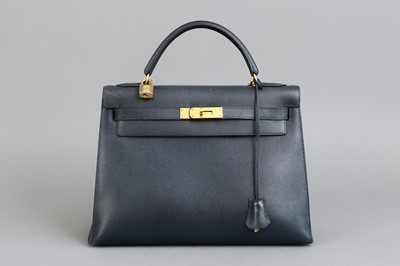 Lot 702 - HERMÈS Kelly 32 Retourné Handtasche